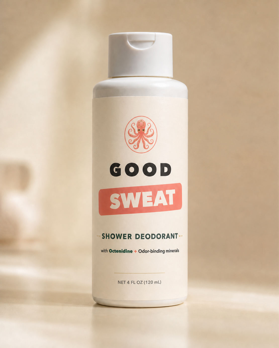 GoodSweat shower deodorant squeeze bottle photographed on warm stone.