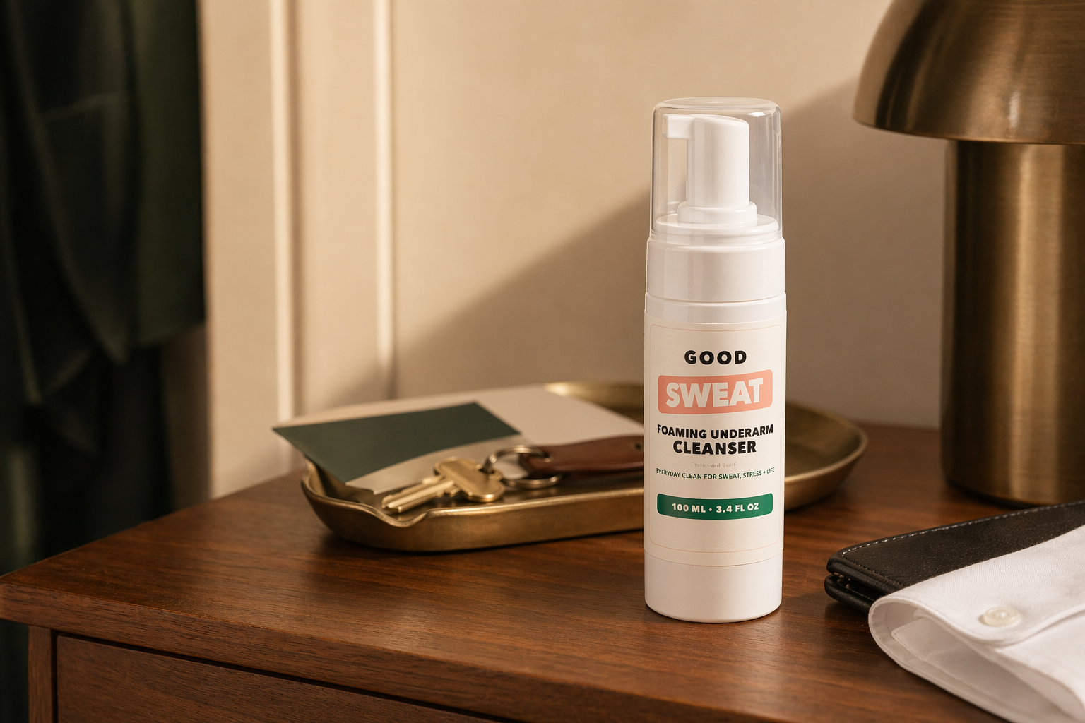 GoodSweat bottle on a small tray with everyday carry items.